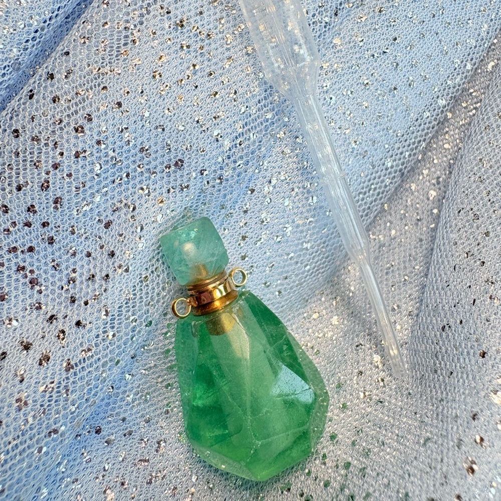 Green Gemstone Bottle with Gold Accents
